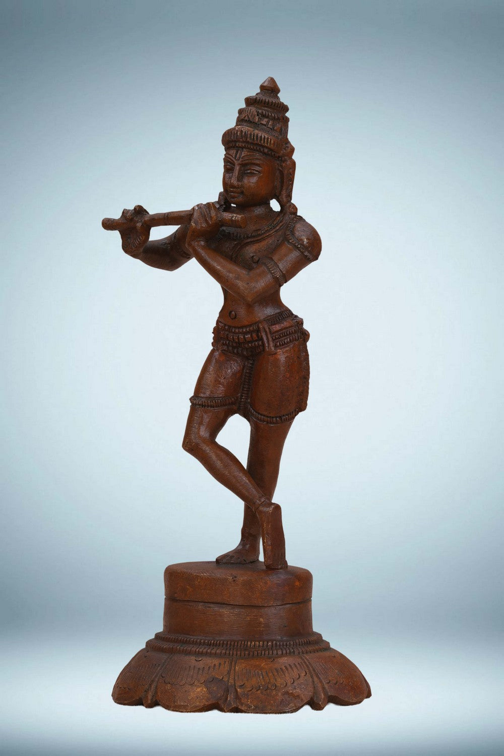 Image of Bronze Krishna playing the flute in a standing