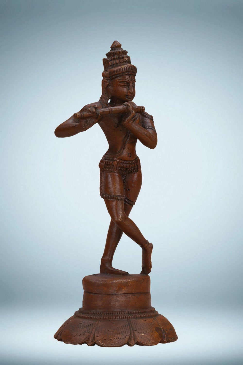 Image of Bronze Krishna playing the flute in a standing