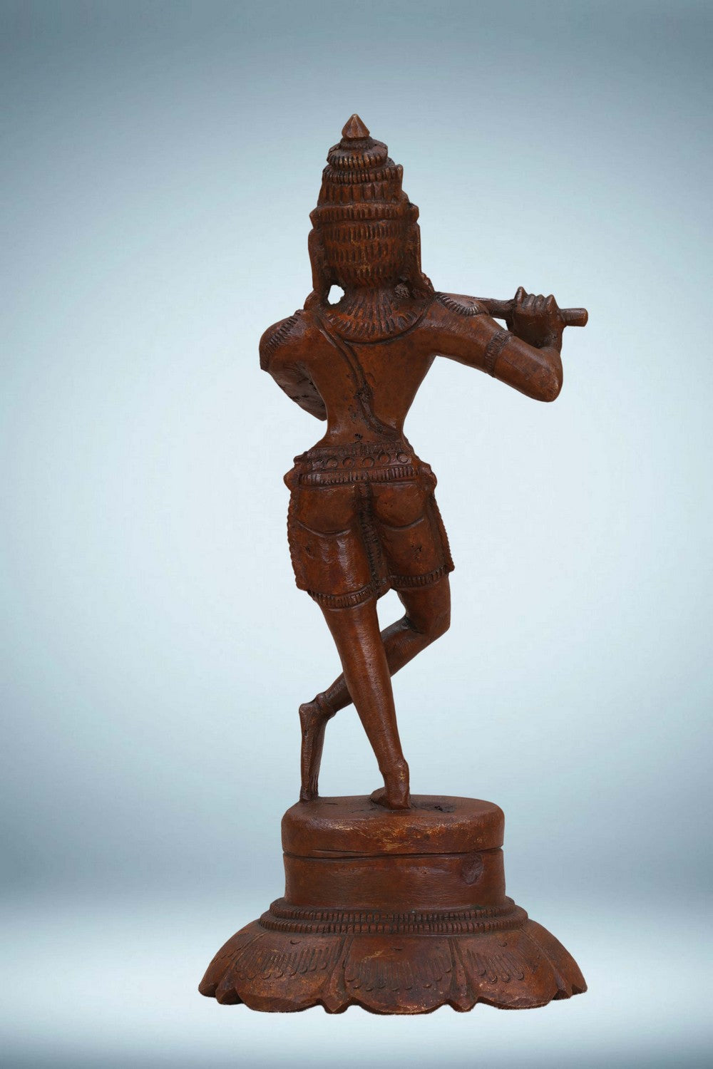 Image of Bronze Krishna playing the flute in a standing