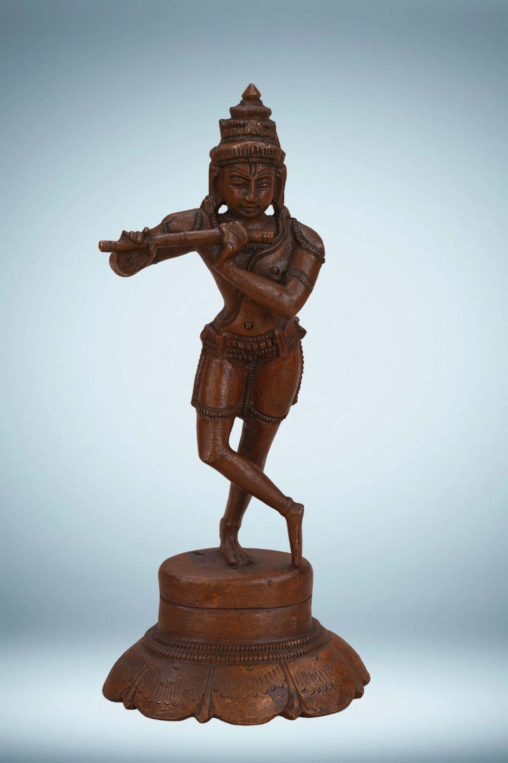 Image of Bronze Krishna playing the flute in a standing