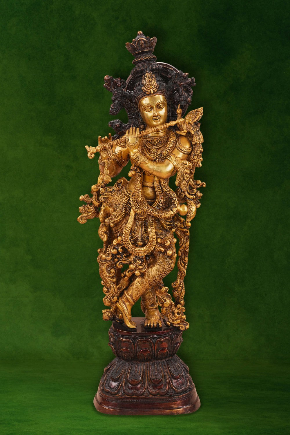 Image of A brass Krishna statue depicting the deity playing the flute