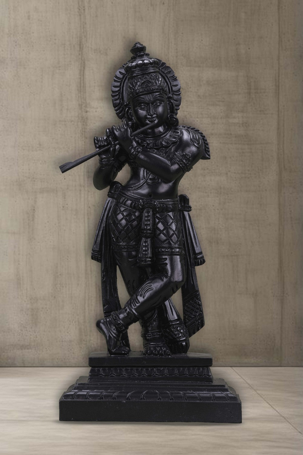 Image of Neem wood idols of Lord Krishna seated