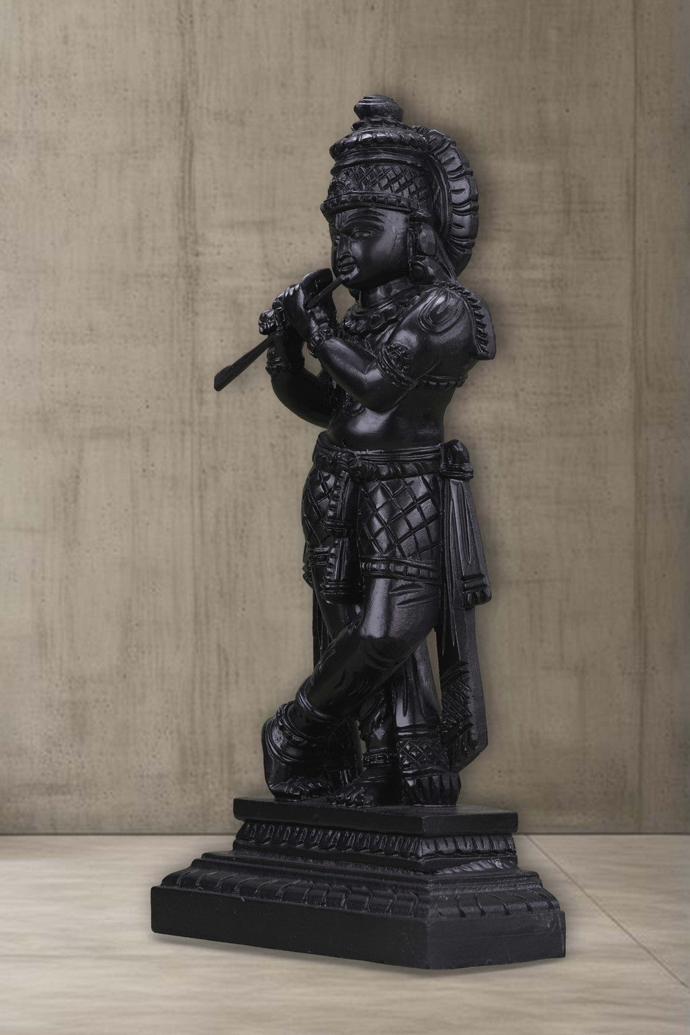 Image of Neem wood idols of Lord Krishna seated