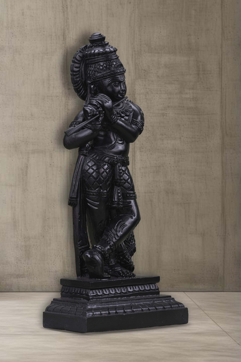 Image of Neem wood idols of Lord Krishna seated