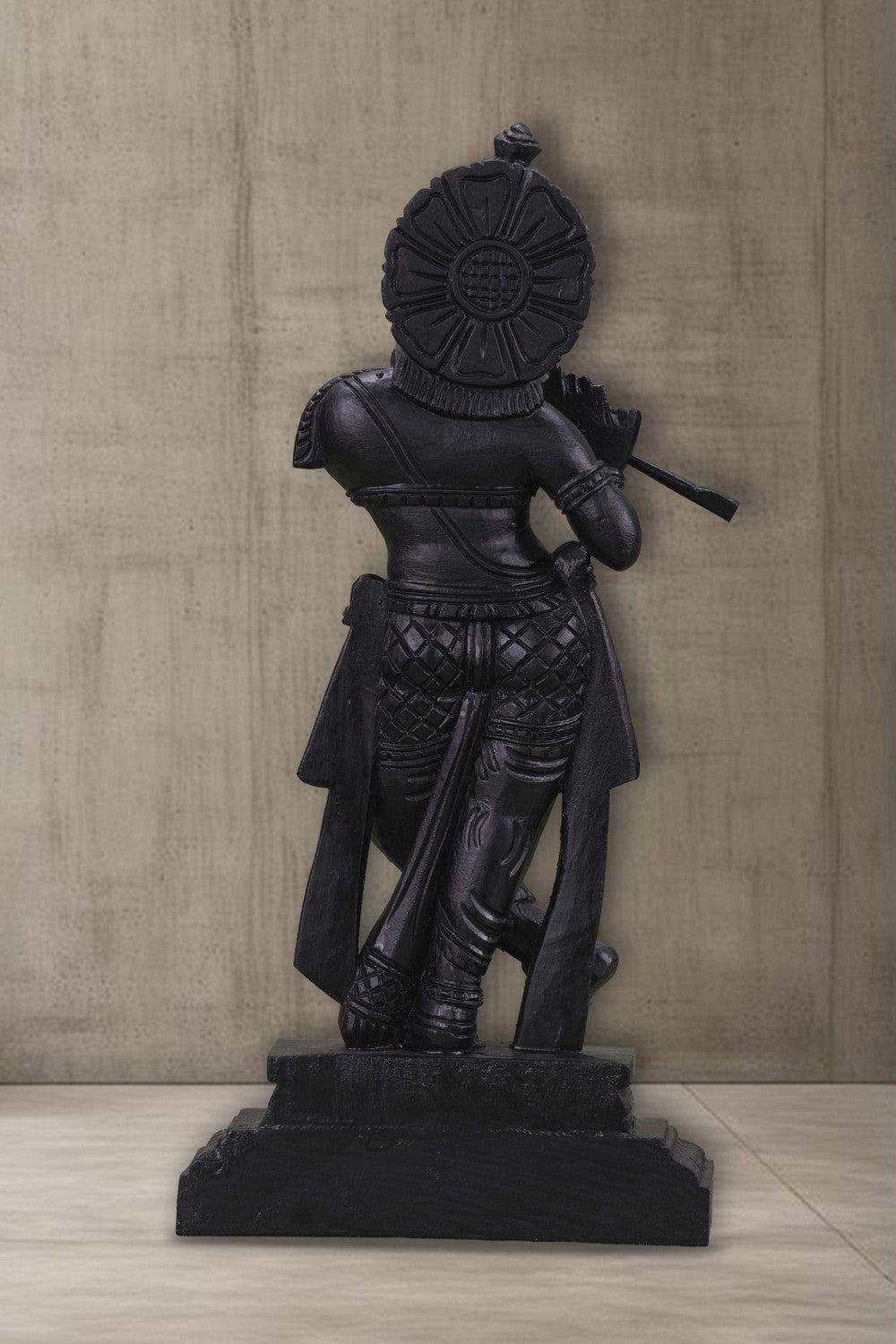 Image of Neem wood idols of Lord Krishna seated