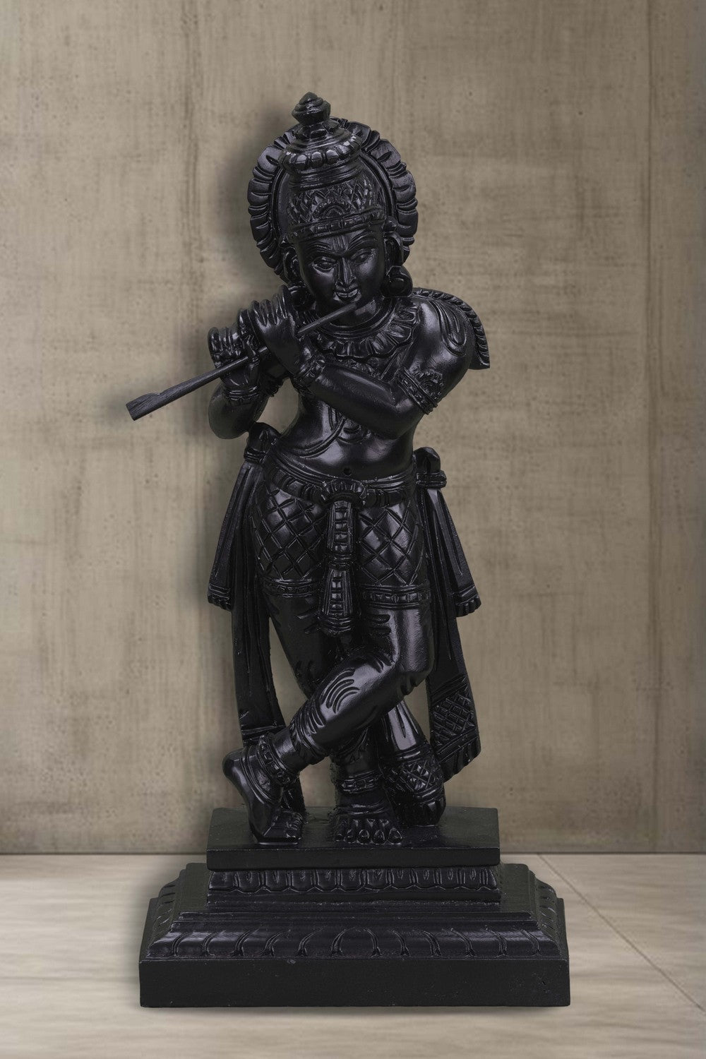 Image of Neem wood idols of Lord Krishna seated