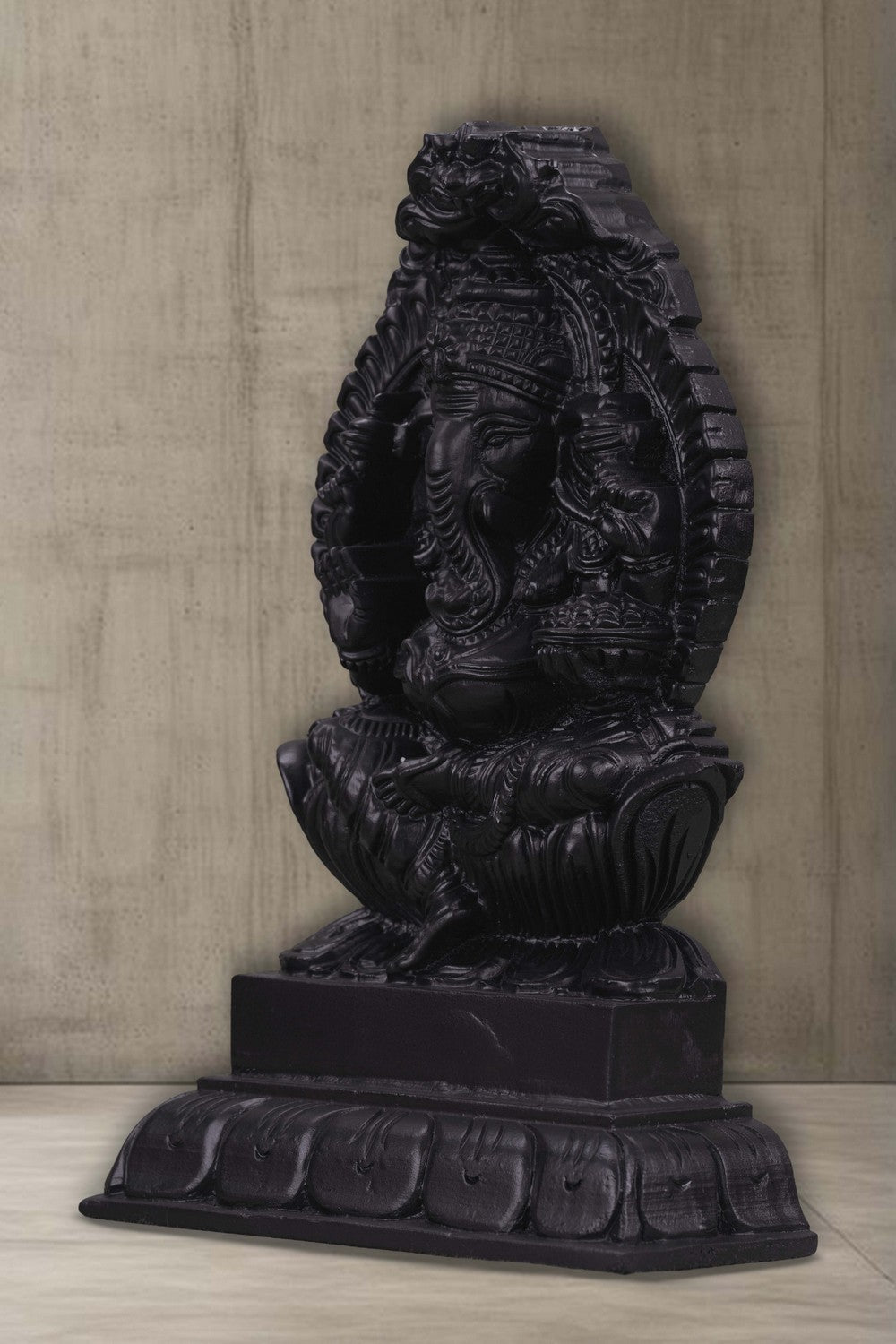 Image of A hand-carved Neem Wood Ganesh Sculpture