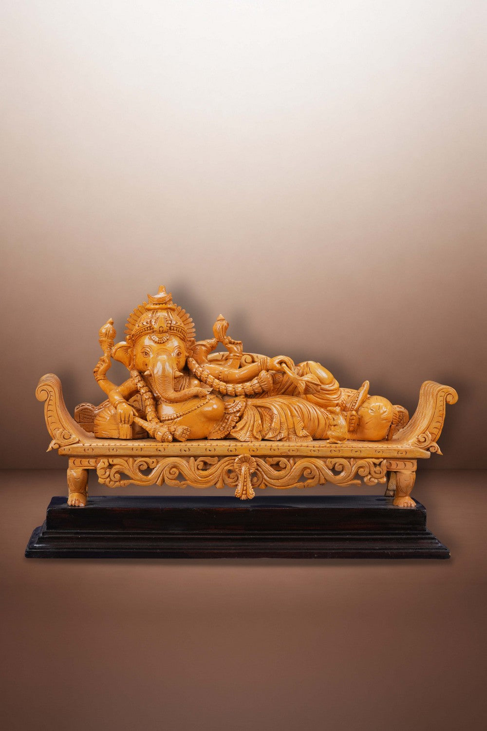 Image of Resting Ganesha Wooden Sculpture