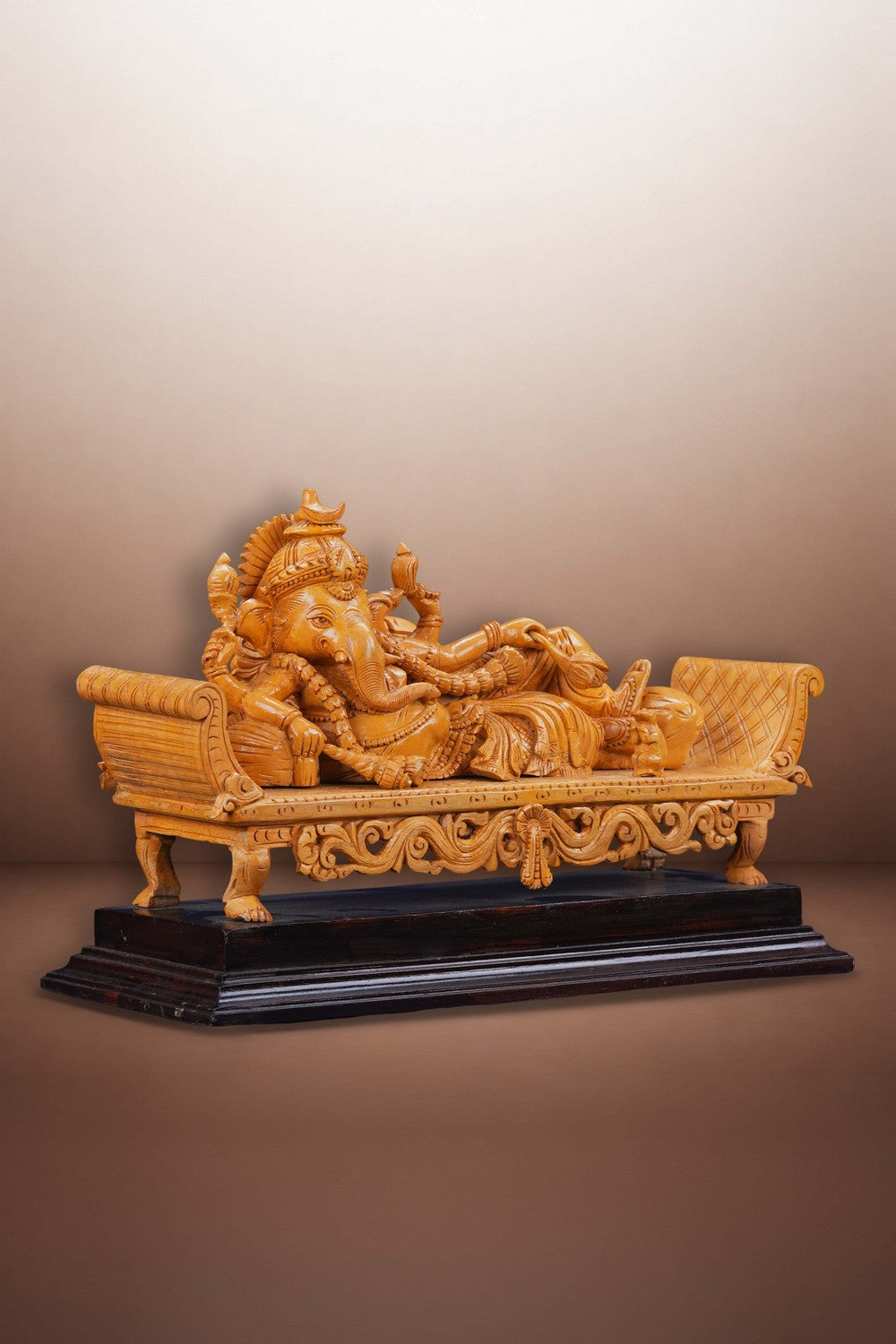 Image of Resting Ganesha Wooden Sculpture