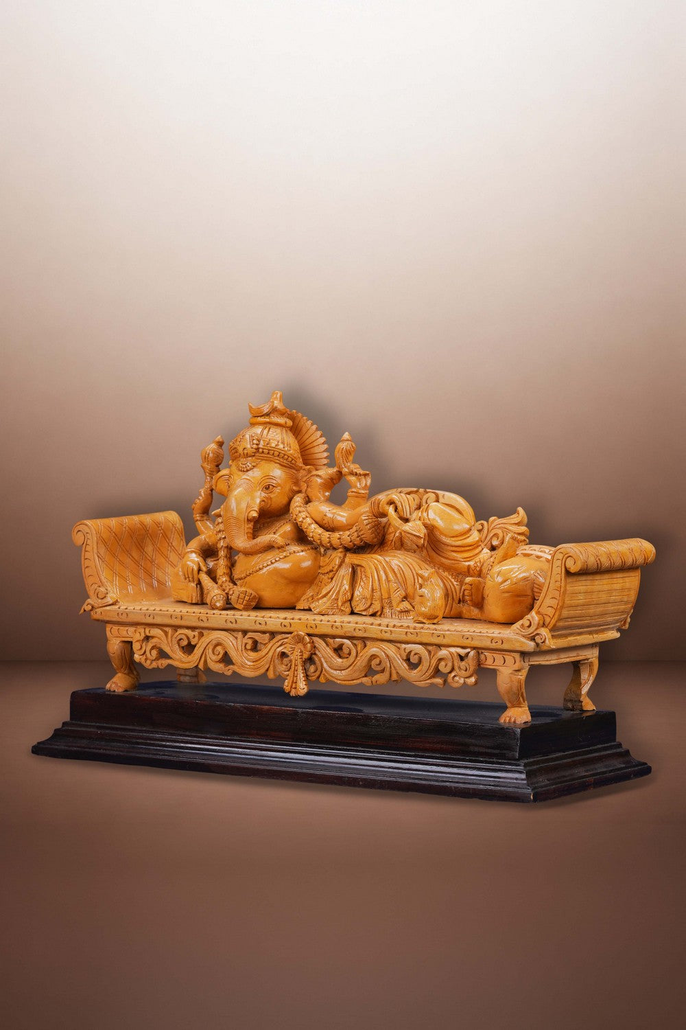 Image of Resting Ganesha Wooden Sculpture