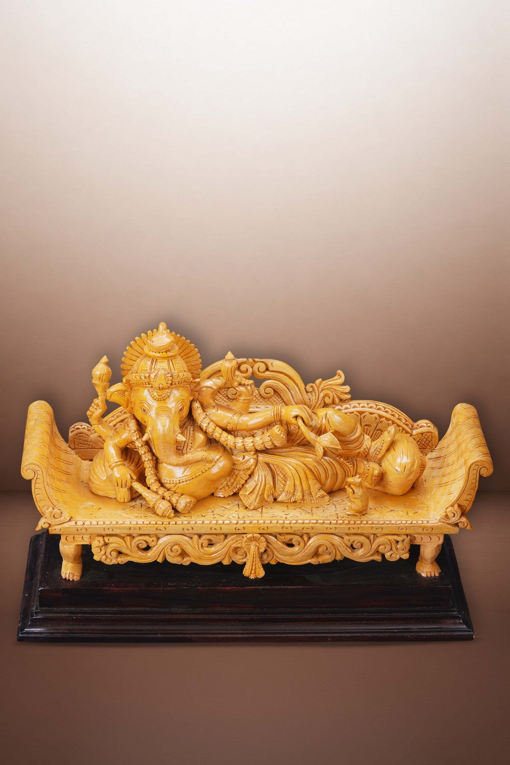 Image of Resting Ganesha Wooden Sculpture