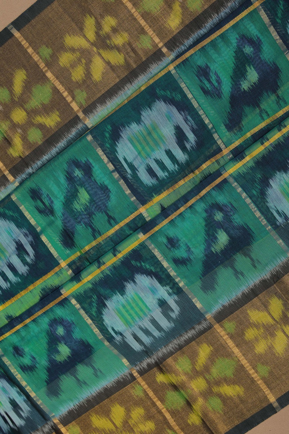Image of Ikat Cotton-Silk Teal Blue Saree
