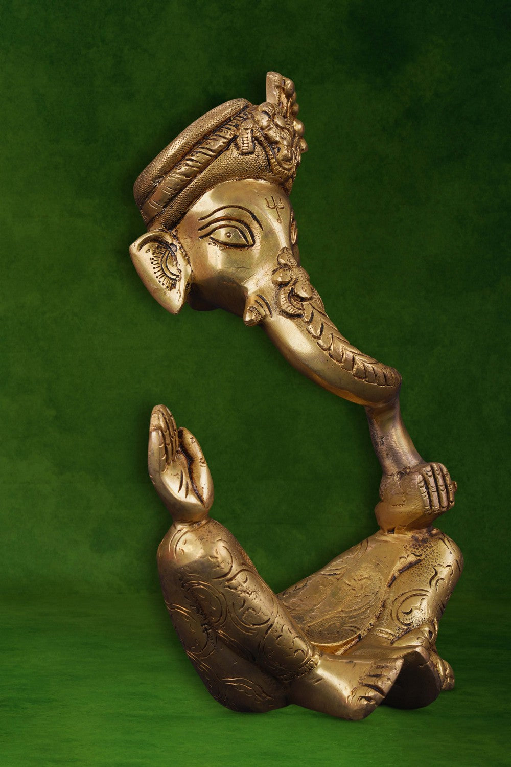 Image of A modern art brass Ganesh in a seated posture