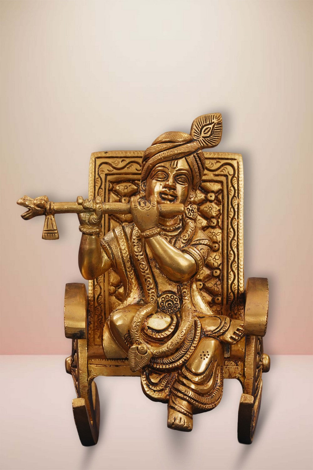 Image of Brass Krishna Seated On A Rocking Chair