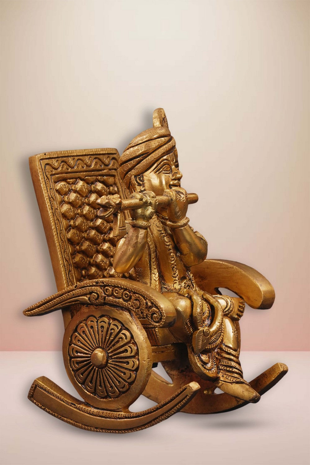Image of Brass Krishna Seated On A Rocking Chair
