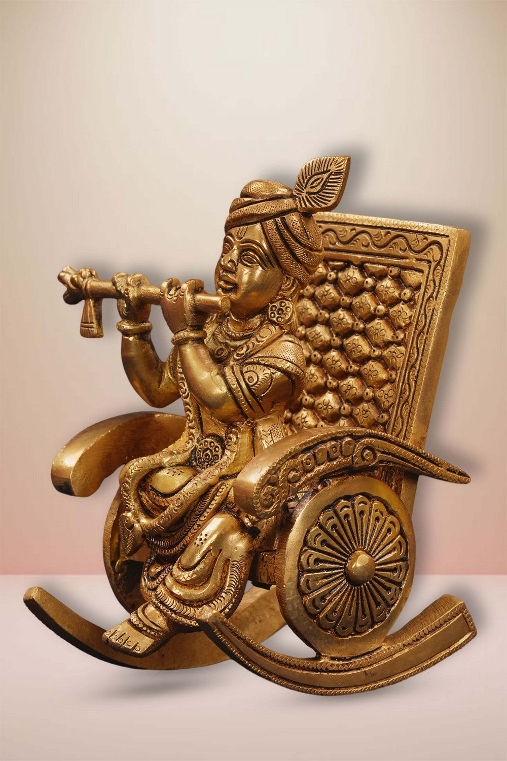 Image of Brass Krishna Seated On A Rocking Chair