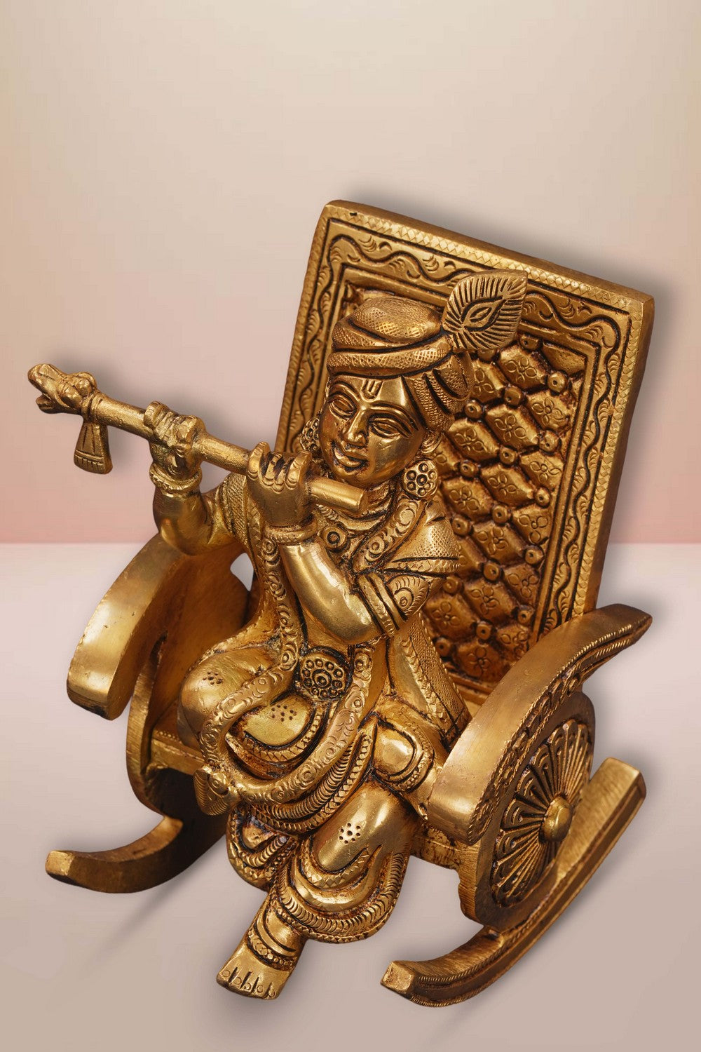 Image of Brass Krishna Seated On A Rocking Chair