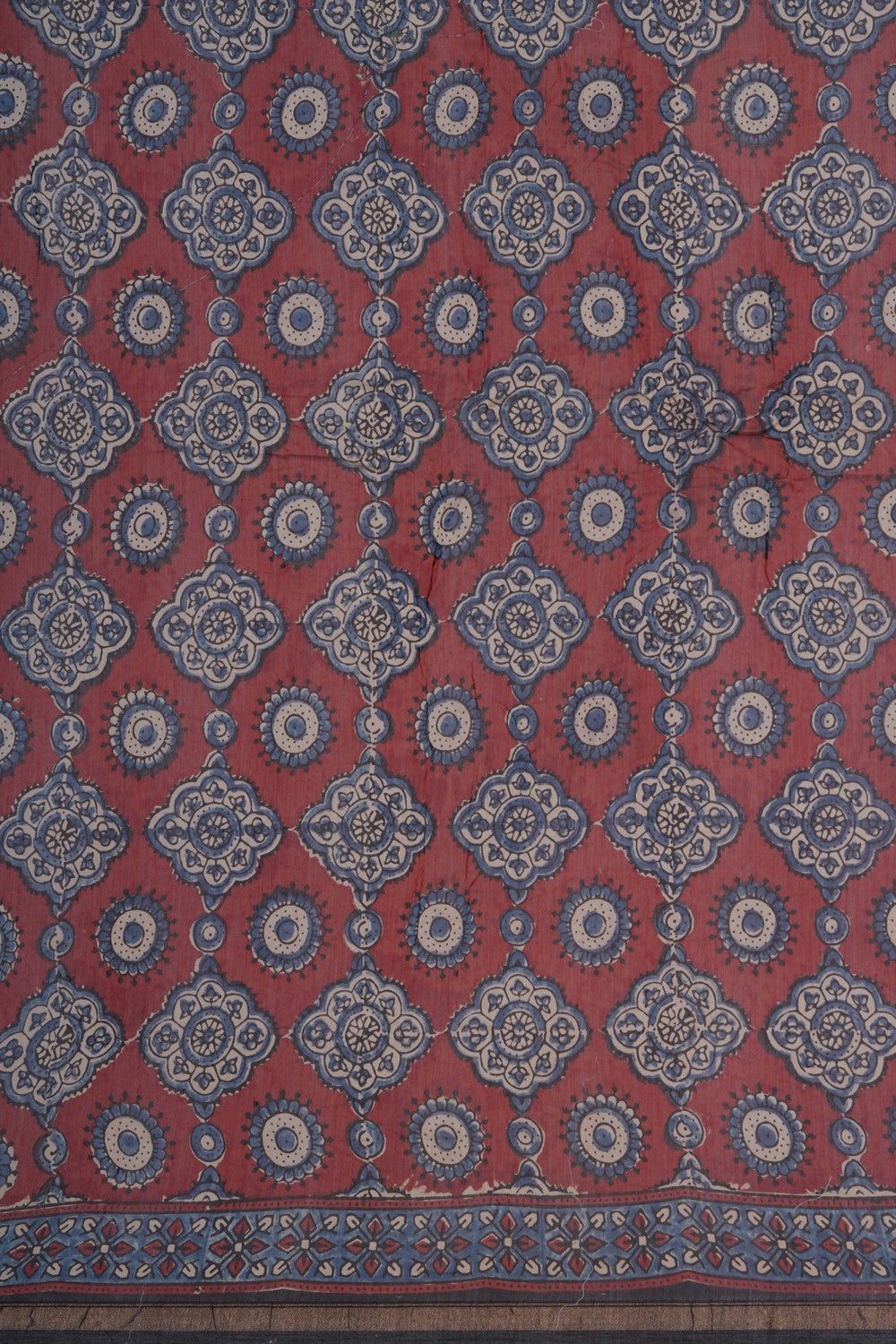 Image of A unique fusion of Bandhani–Ajrakh Saree