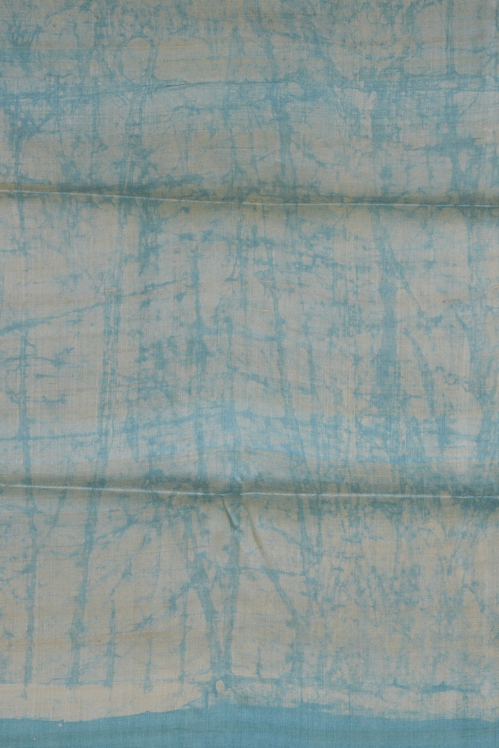 Image of A Sky Blue Tussar Batik Print Saree