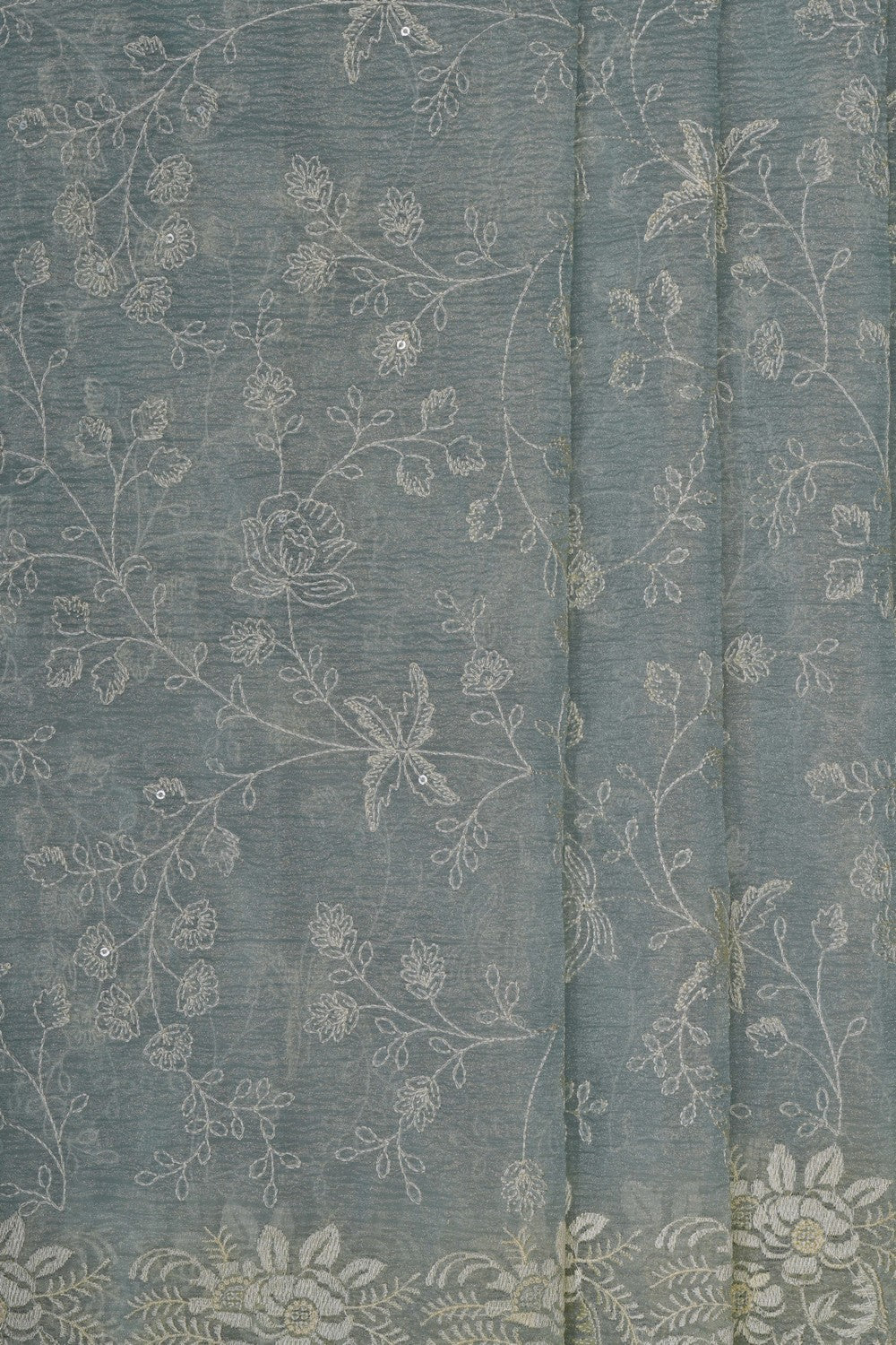 Image of Pastel Blue Shimmering Tissue Silk Saree