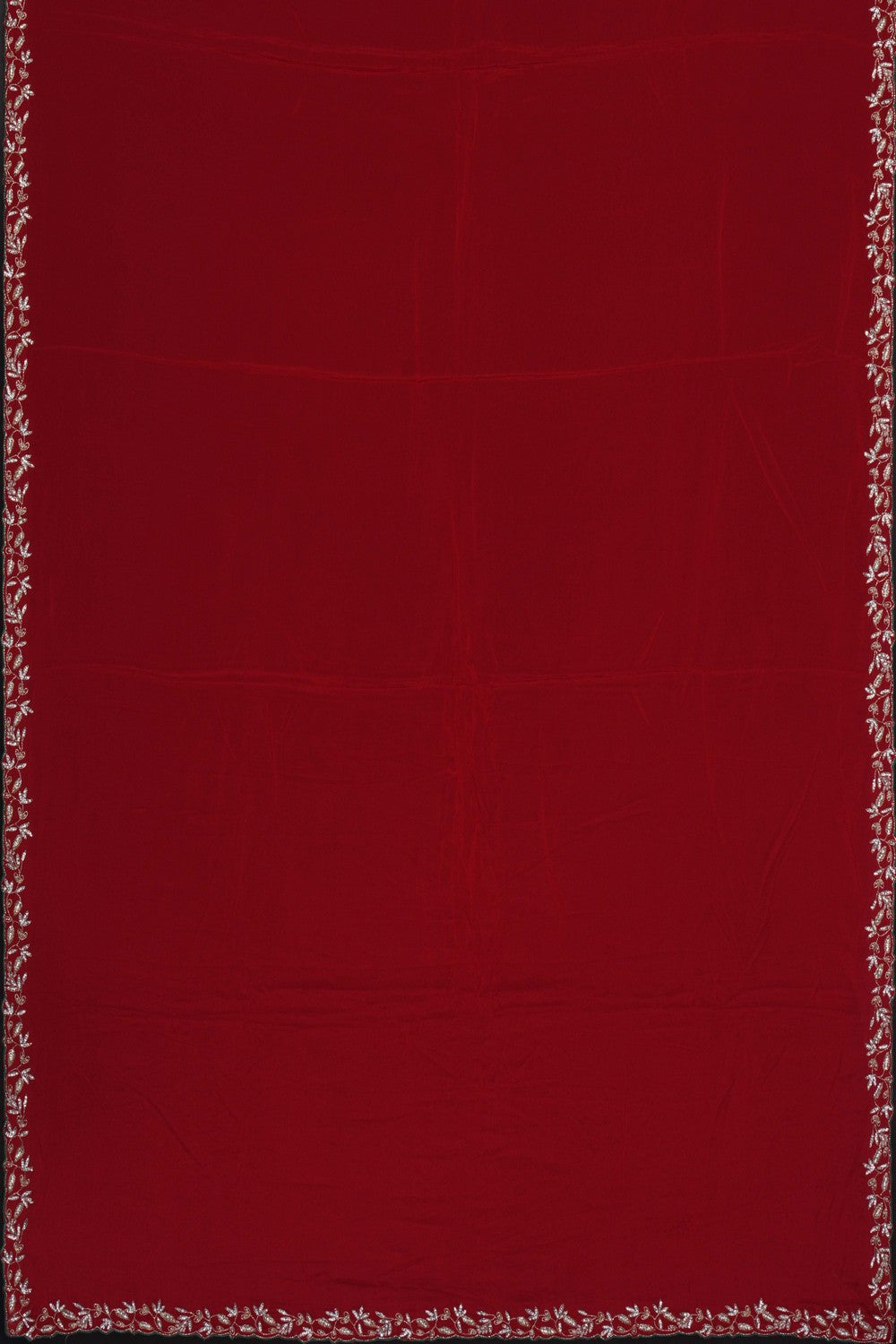 Image of Skillfully Embroidered Onto The Drape