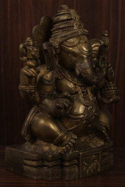 Collection of Handcrafted Brass Ganpati in a gallery layout