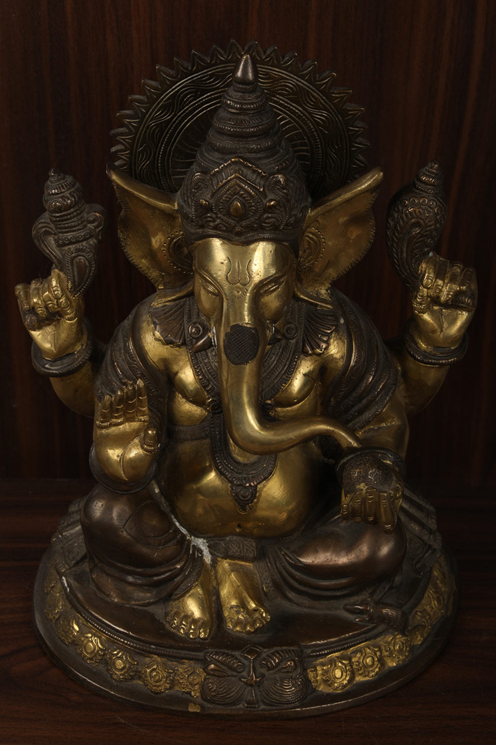 Collection of Handcrafted Brass Ganpati in a gallery layout