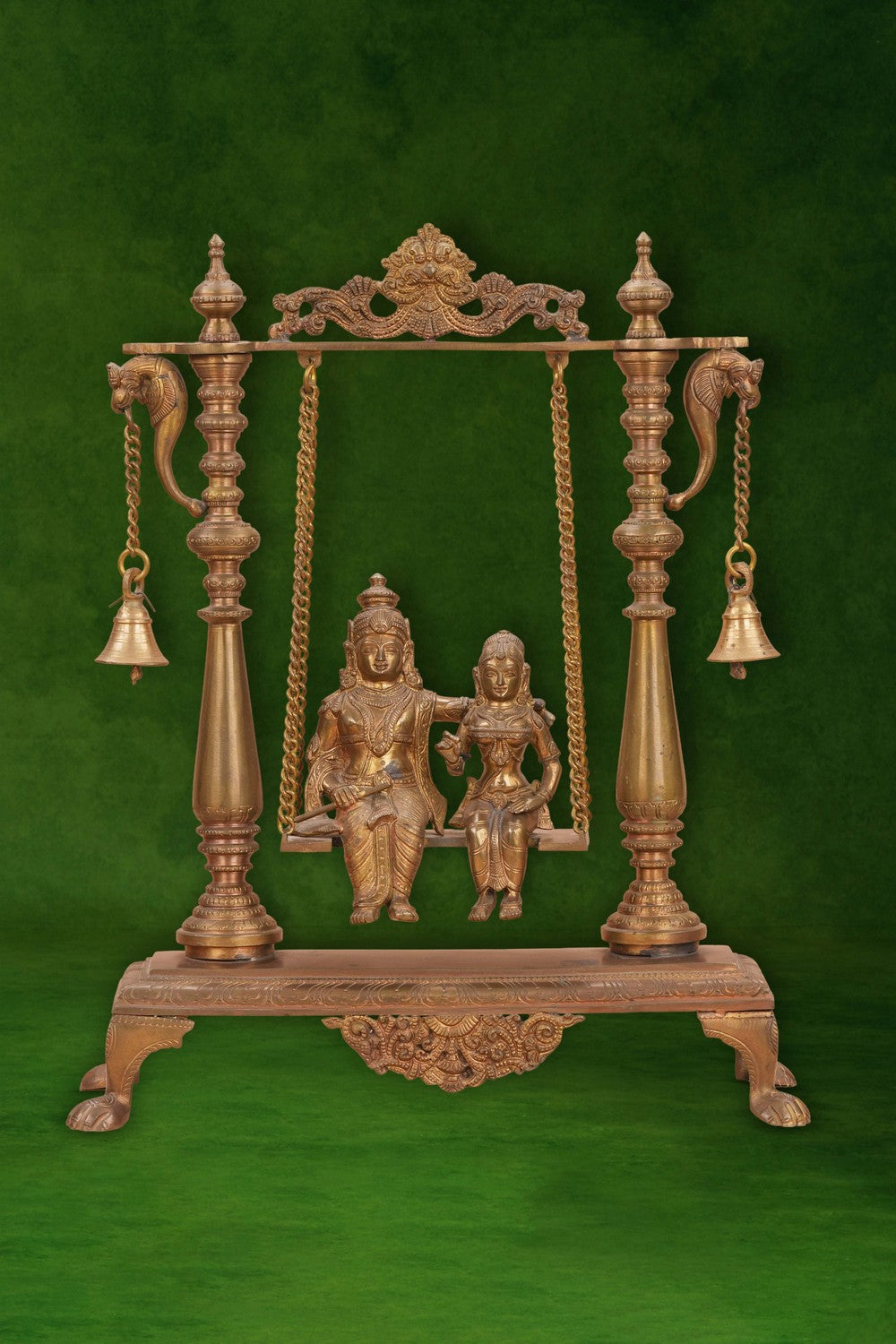 Image of Radha Krishna on a Swing with Bell Atop In Brass