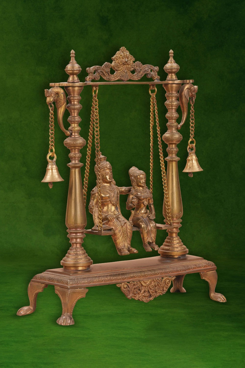 Image of Radha Krishna on a Swing with Bell Atop In Brass