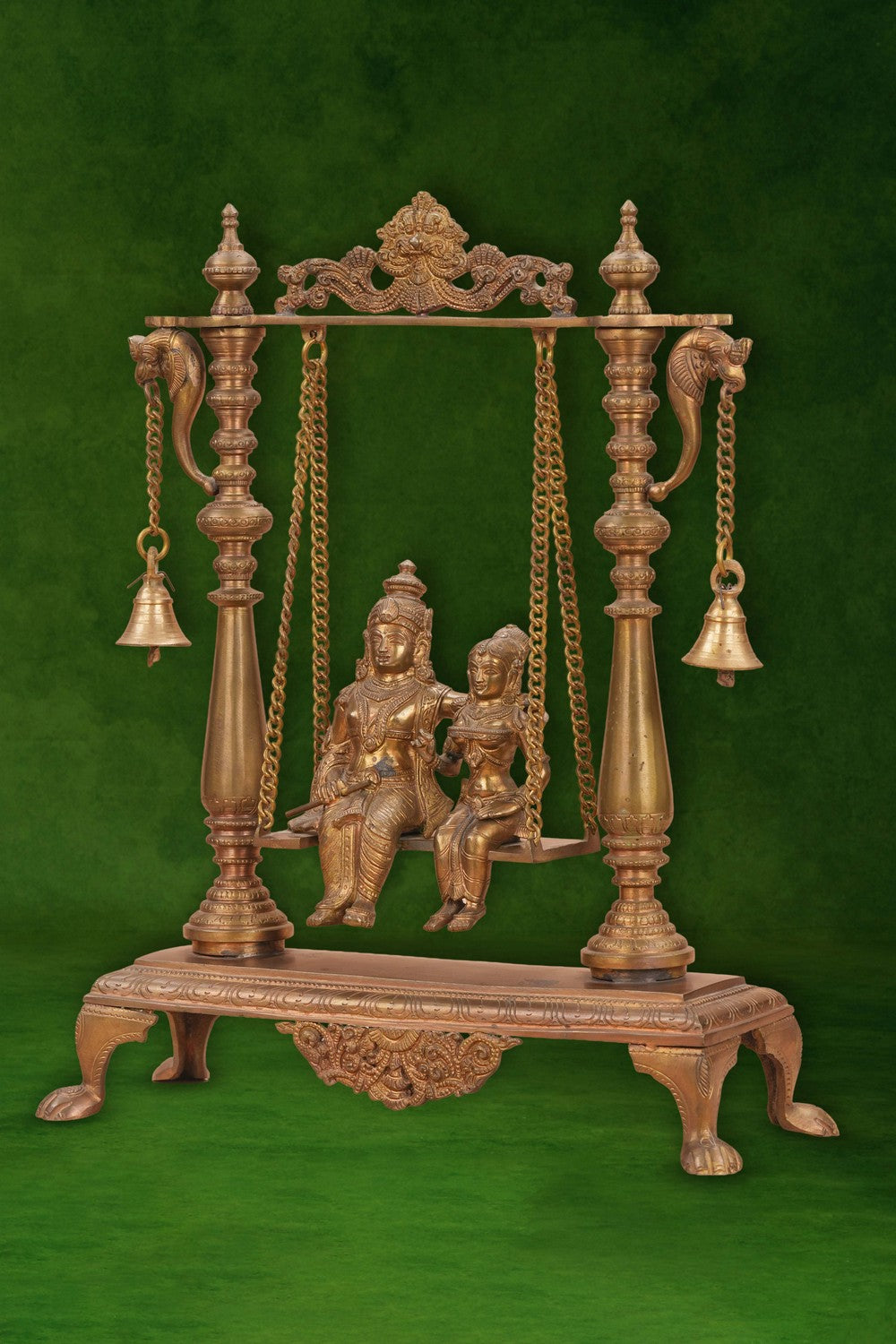 Image of Radha Krishna on a Swing with Bell Atop In Brass