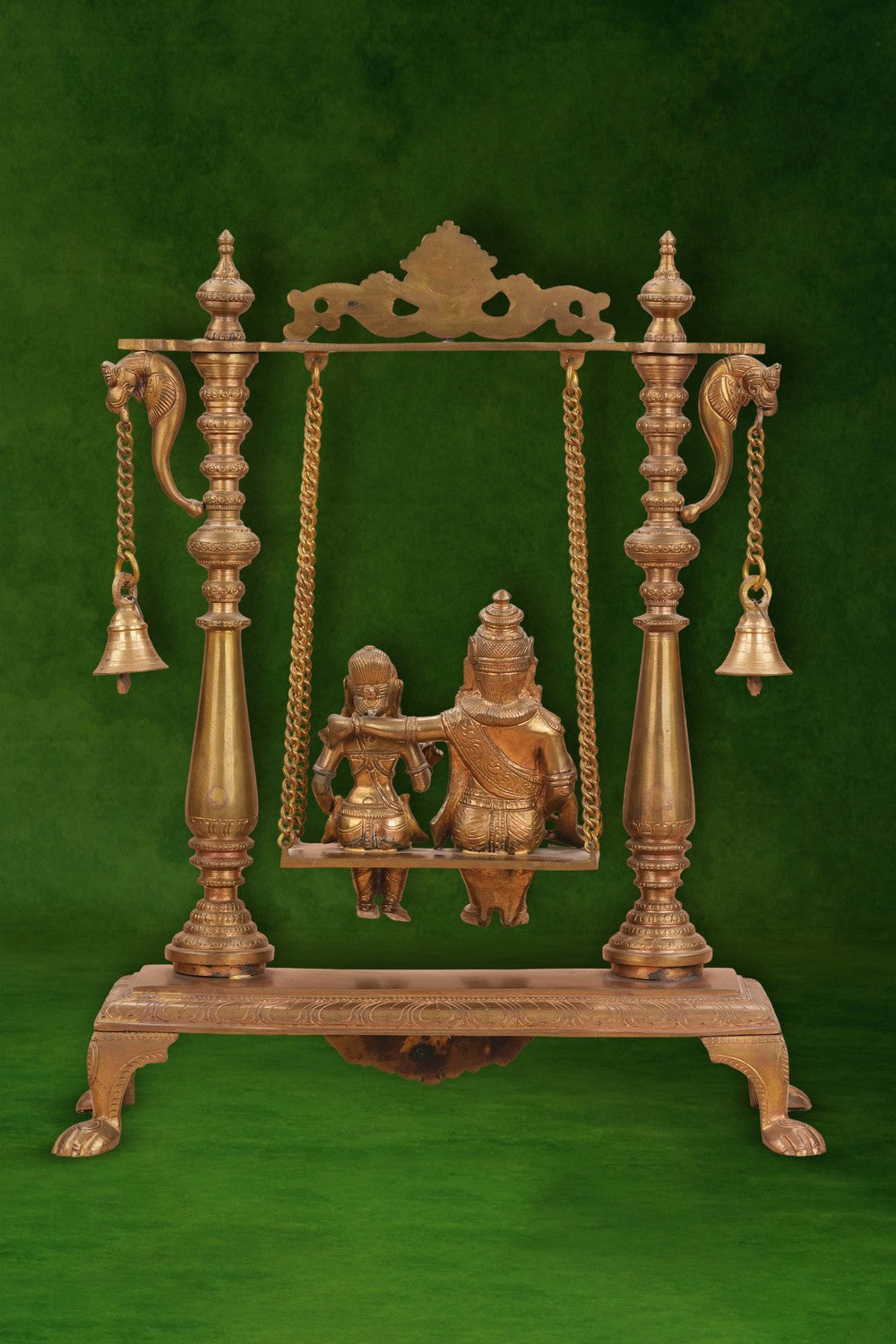 Image of Radha Krishna on a Swing with Bell Atop In Brass