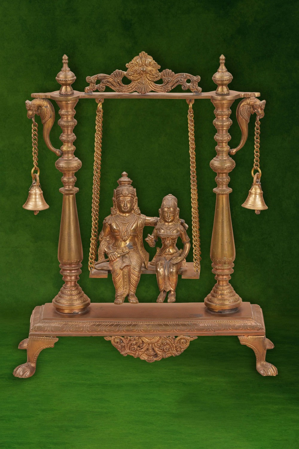 Image of Radha Krishna on a Swing with Bell Atop In Brass