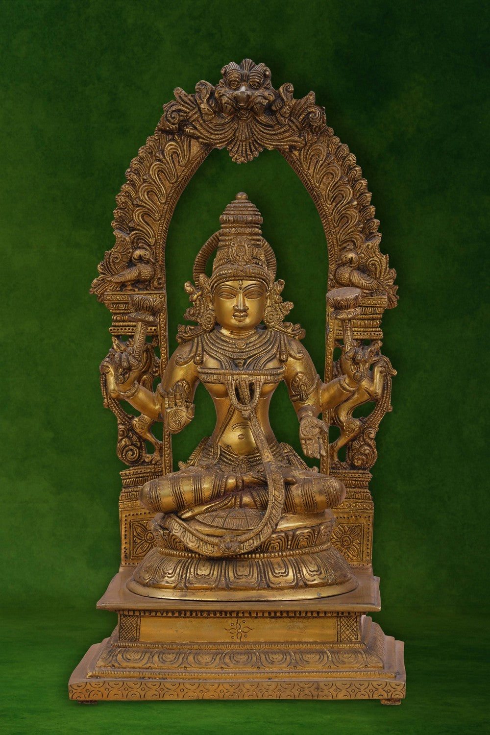 Image of Brass Maa Lakshmi with an antique finish seated on a lotus