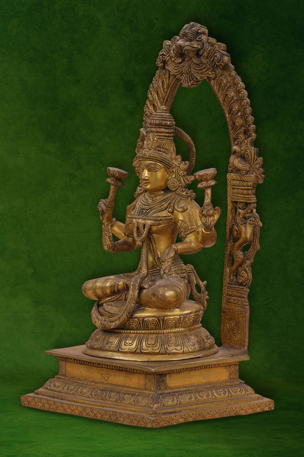 Image of Brass Maa Lakshmi with an antique finish seated on a lotus