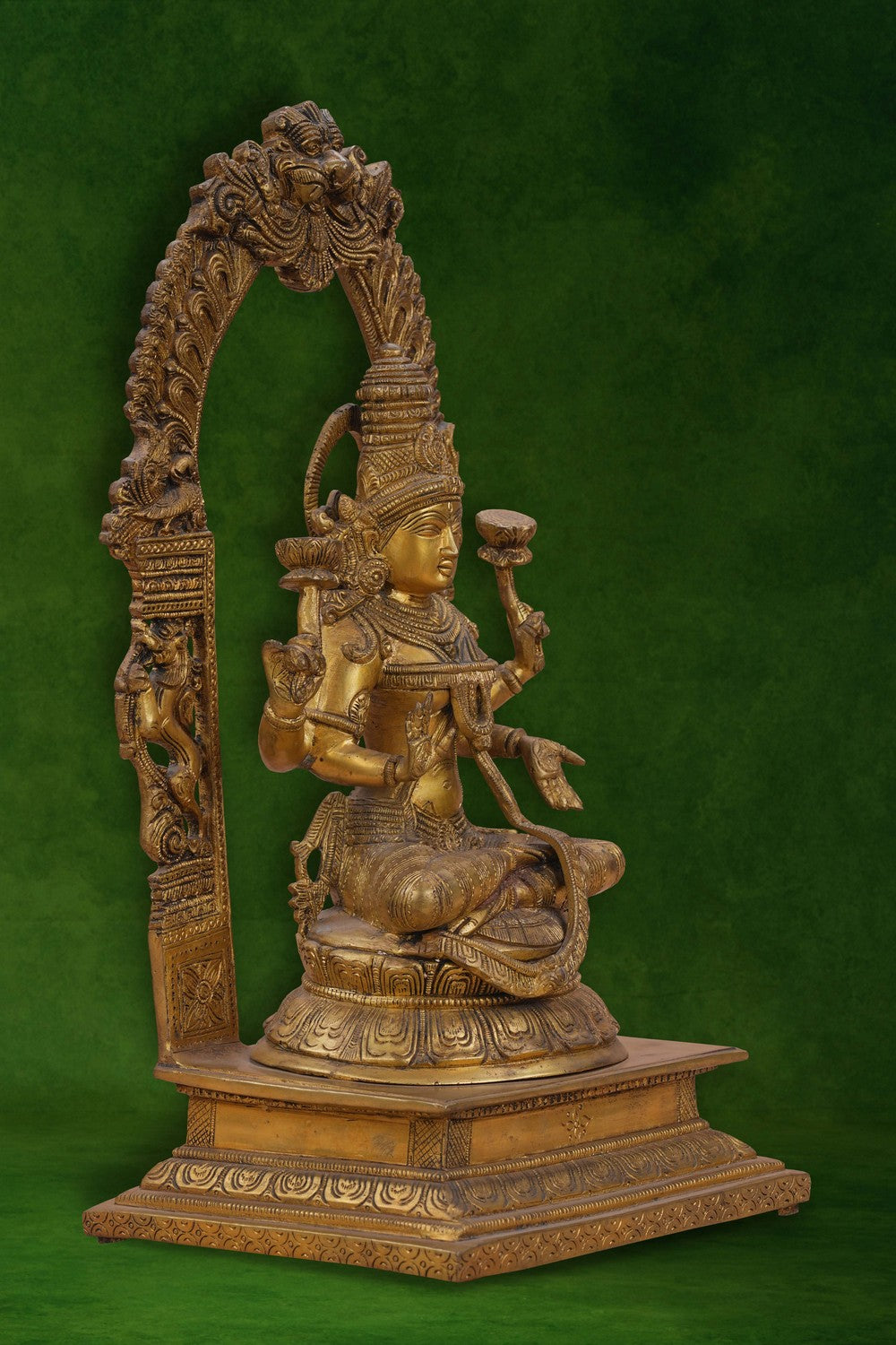 Image of Brass Maa Lakshmi with an antique finish seated on a lotus