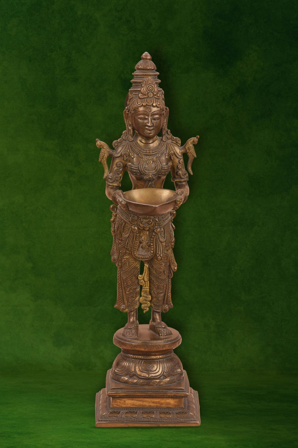 Image of Brass Woman in standing posture holding a diya
