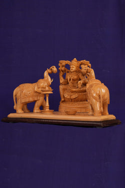 Image of White Cedar Wooden MahaLakshmi Statue With Elephants