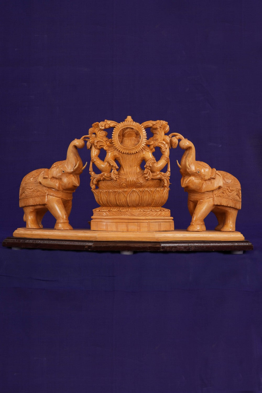 Image of White Cedar Wooden MahaLakshmi Statue With Elephants