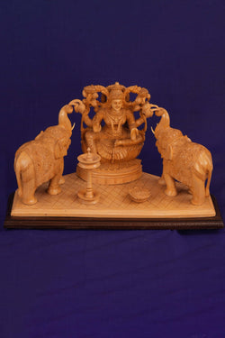 Image of White Cedar Wooden MahaLakshmi Statue With Elephants