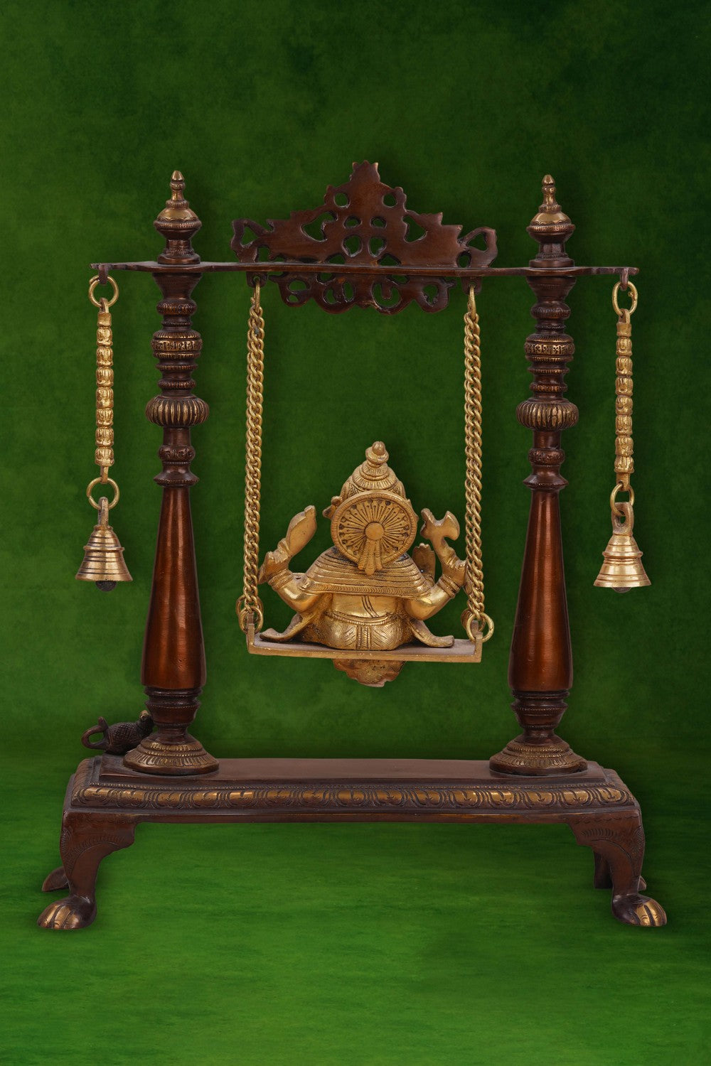 Image of Brass-Copper idol of Ganesha seated on an ornate swing