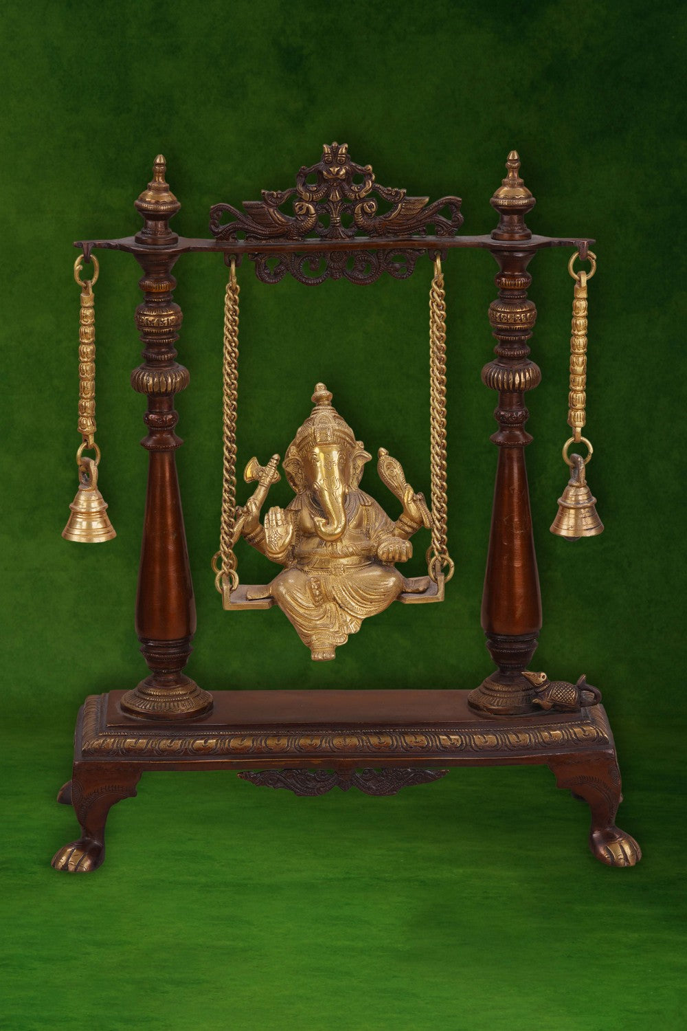 Image of Brass-Copper idol of Ganesha seated on an ornate swing