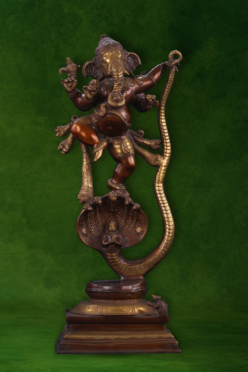 Image of Brass Ganesha idol dancing on a snake