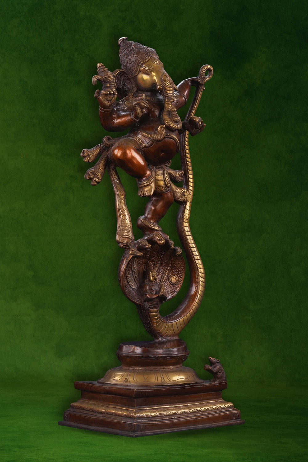 Image of Brass Ganesha idol dancing on a snake