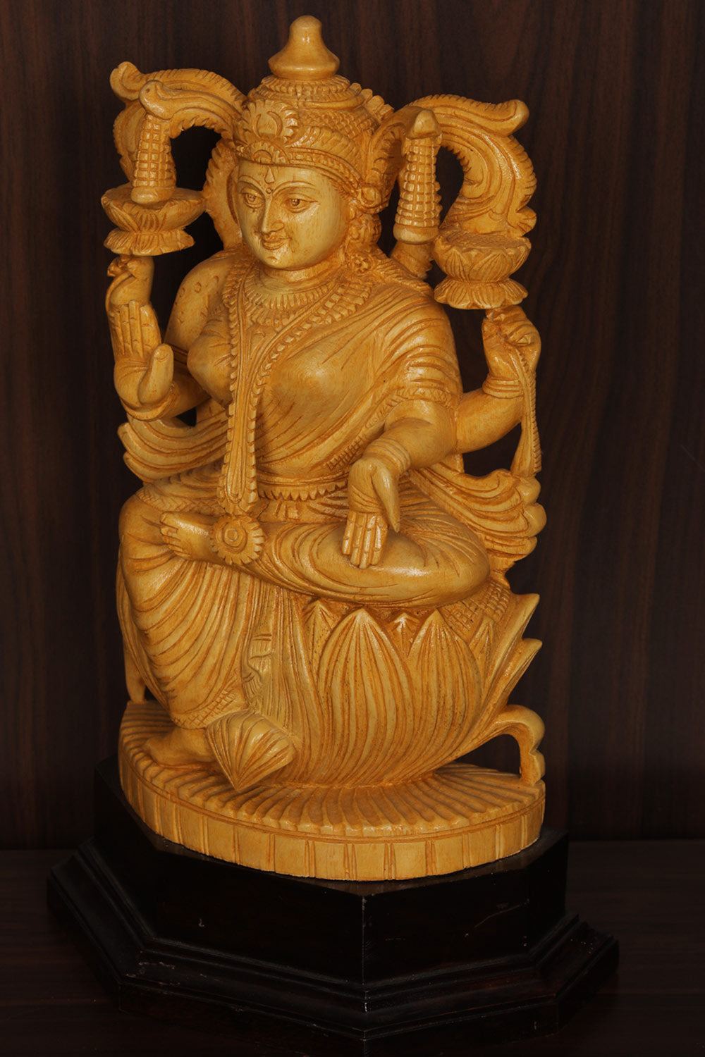 Collection of Shutters Wood Goddess Vishu Priya Lakshmi Idol in a gallery layout