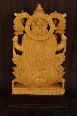 Collection of Shutters Wood Goddess Vishu Priya Lakshmi Idol in a gallery layout