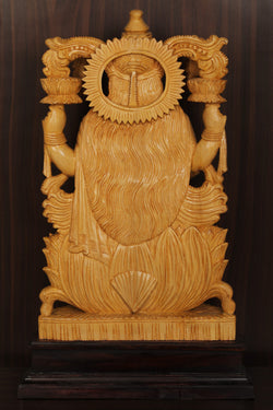 Collection of Shutters Wood Goddess Dhana Lakshmi Idol in a gallery layout