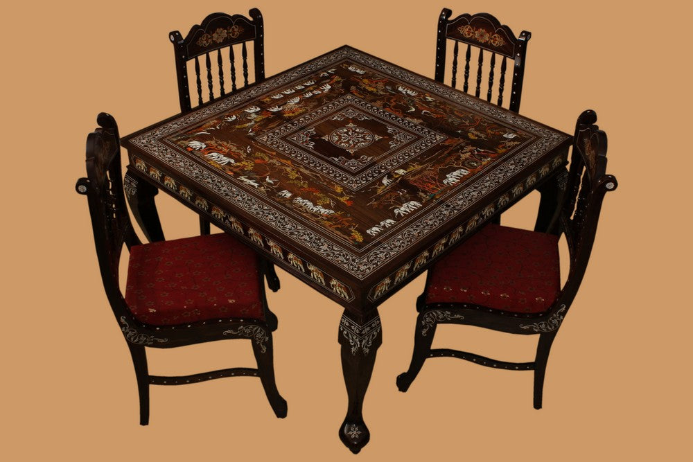 Collection of Rosewood Inlay dining table with 4 carved chairs in a gallery layout