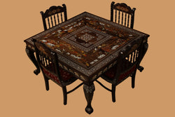 Collection of Rosewood Inlay dining table with 4 carved chairs in a gallery layout