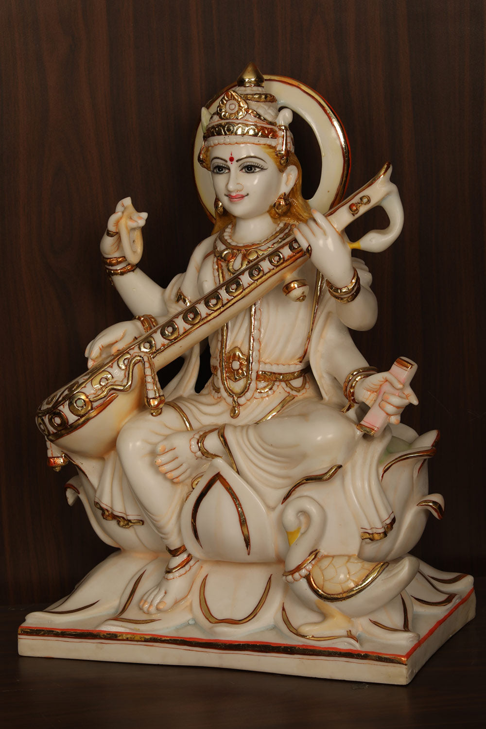 Collection of Cultured Marble Goddess Saraswati Statue in a gallery layout