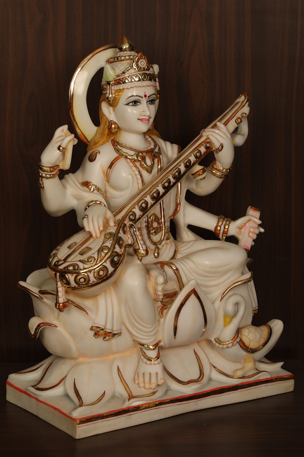 Collection of Cultured Marble Goddess Saraswati Statue in a gallery layout